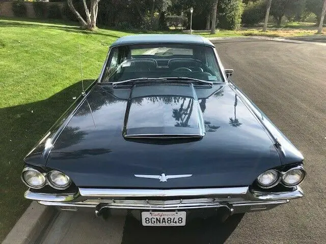 Beautiful 65 T-bird convertible -- Caspian Blue w/Silver Mink interior