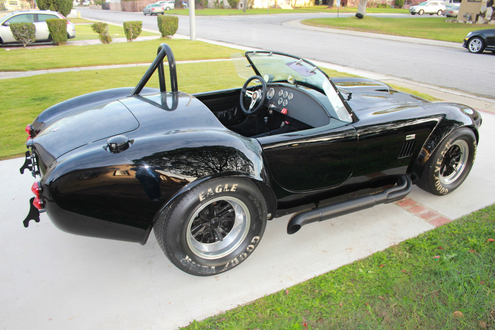 1965 427 Ford Cobra roadster...black on black, perfect condition ...