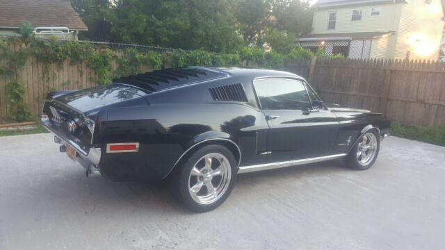 1968 MUSTANG FASTBACK. BLACK ON BLACK ON CHROME WITH UNIQUE TOUCHES ...